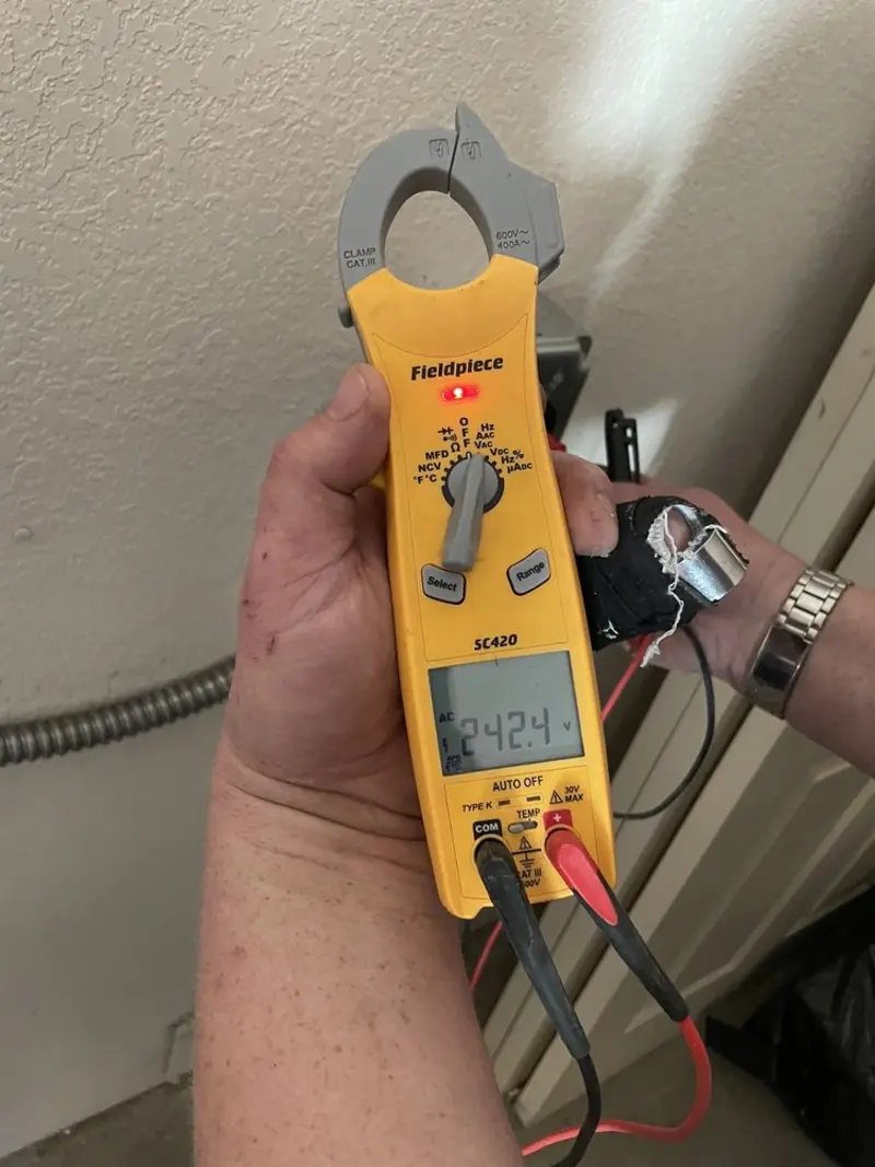 Voltage testing with clamp meter during Generator Installation in East Aurora
